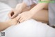 A woman getting a foot massage at a spa.